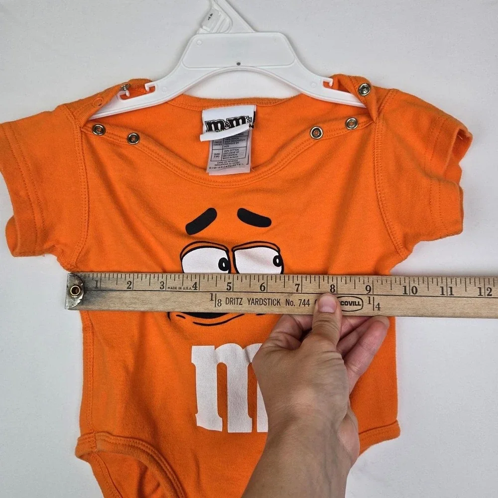 M&M's World orange baby onesie Size 9 months